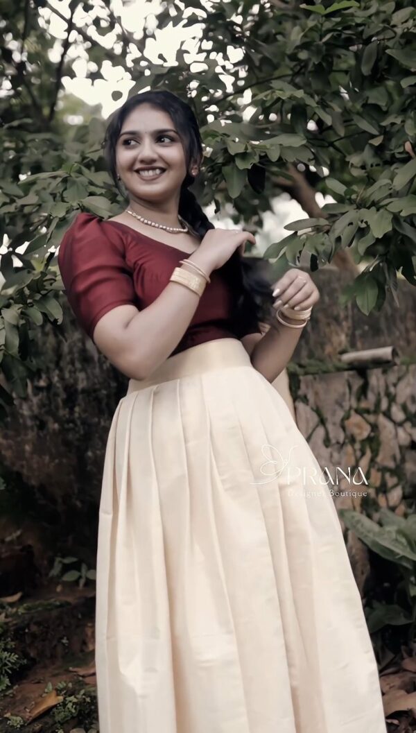 Tissue gold traditional pleated skirt and vichitra silk simple crop top with v neck and small puff sleeves - Image 3